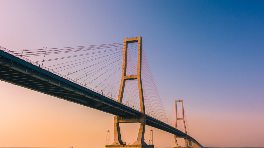 Bridge symbolizing financial obstacles for plaintiff law firms seeking traditional business loans, highlighting the need for alternative litigation financing solutions.